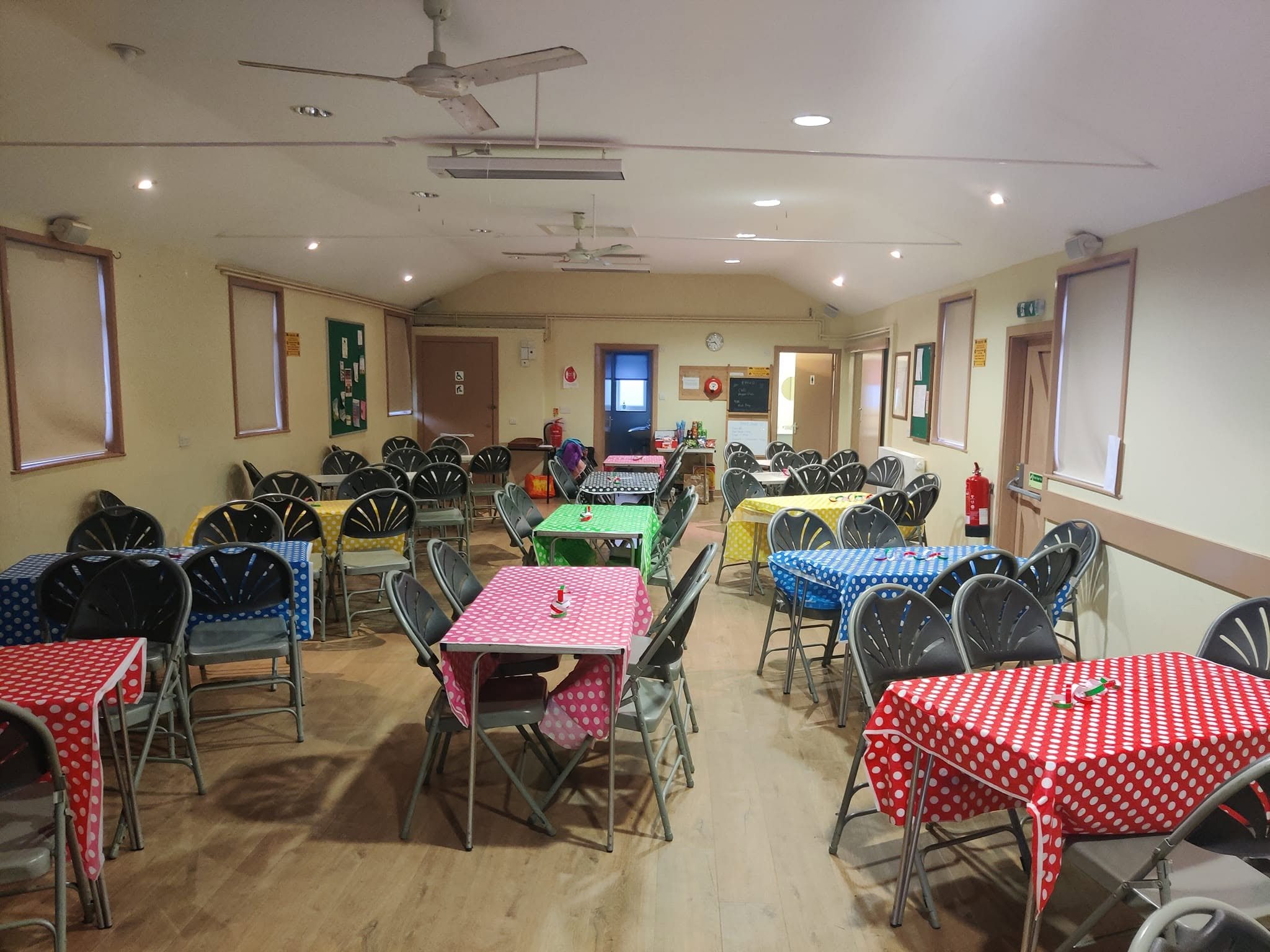 Tonwell Village Hall set up with tables and chairs for a gathering